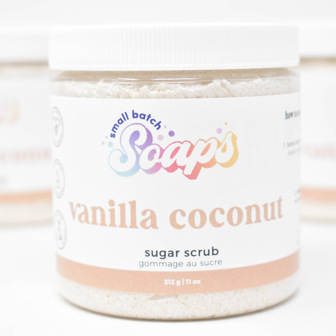 Jar of vanilla coconut sugar scrub with 'Small Batch Soaps' branding on a white background
