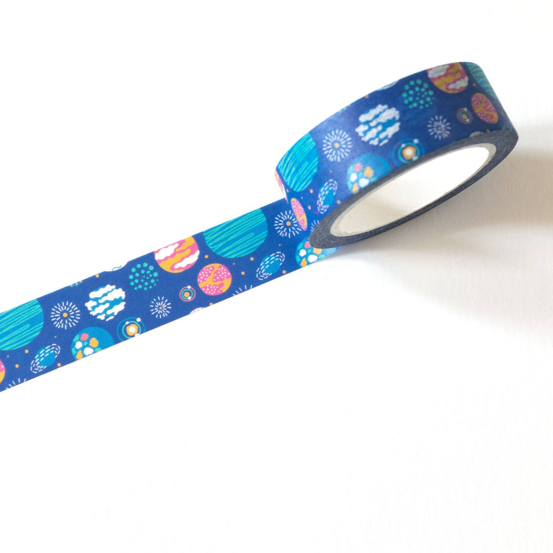 Decorative tape with space-themed design on a white background