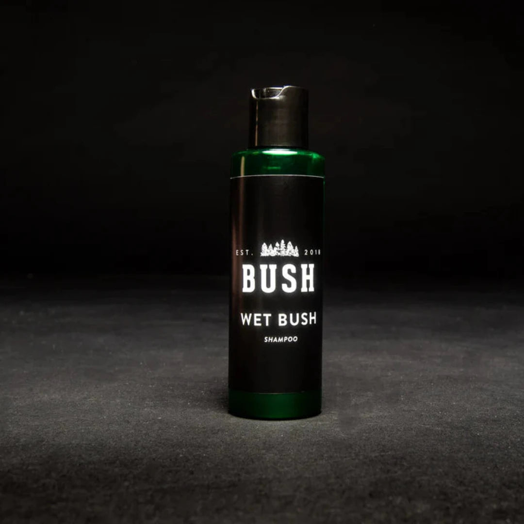 Wet Bush Beard Shampoo is a none foaming beard shampoo for sensative skin in a green bottle with black cap.
