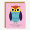 A pink card with colourful owl and quote 
