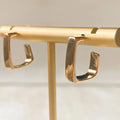 The Gold Squared Hoops are 18K gold plated with a stainless steel post that is nickel free product close up