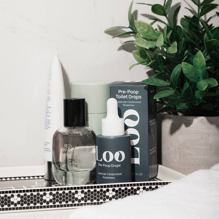 Lavender Cedarwood Rosemary Pre-Poop Toilet Drops, a toilet air freshener in a convenient dropper bottle.