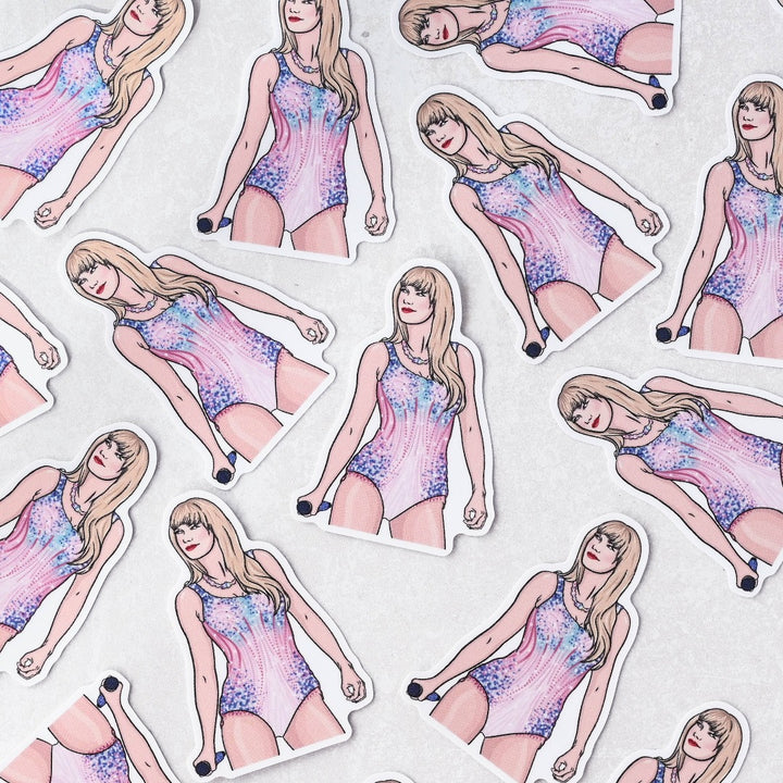 A bunch of Taylor Lover Era Sticker, a white sticker with an image of Taylor Swift in her Lover bodysuit from the Eras Tour.
