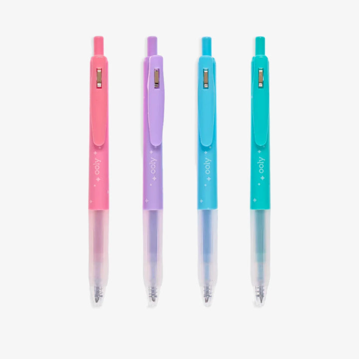 A package of four colorful glitter gel pens. The pens are pink, purple, blue, and turquoise, and they are packaged in a clear plastic case with a colorful background. The packaging says 