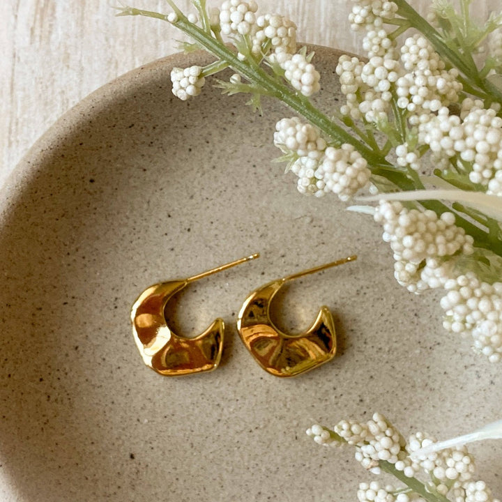 Gold Alli Hoops, gold post earrings in an organic chunky hoop shape.