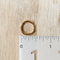 Justine Hoop, a simple round hoop earring.