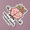 A pink cartoon brain with a smiling face is meditating. The brain has flowers growing from the top and is surrounded by the text 