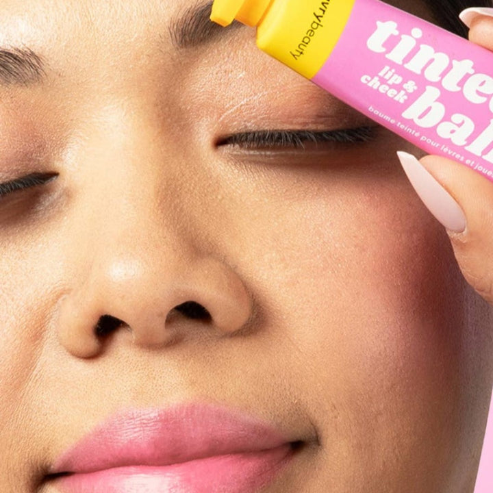 Red-dy or Not Lip & Cheek Tinted Balm, a liquid blush used on a asian woman's eyes, cheeks and lips.