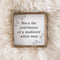 A framed print with the text 