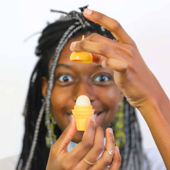 Orange Dreamsicle Lip Balm in an ice cream cone shape.