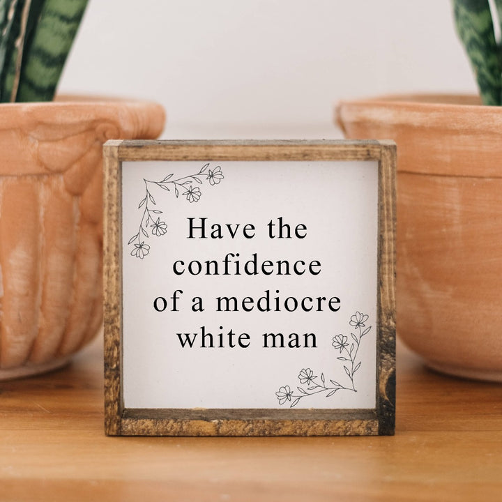 A framed print with the text 