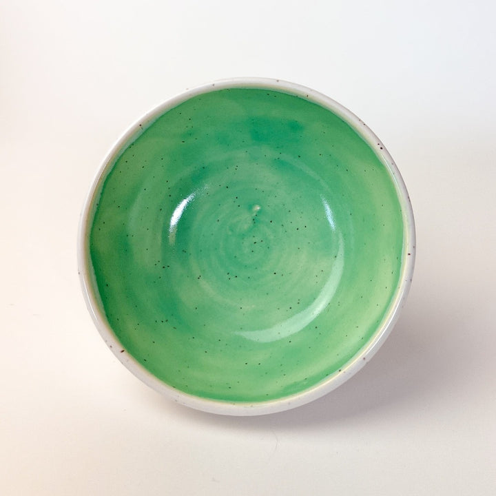 Green Colourful Trinket Dish, a small bowls with colour on the inside and speckled cream coloured clay on the outside.