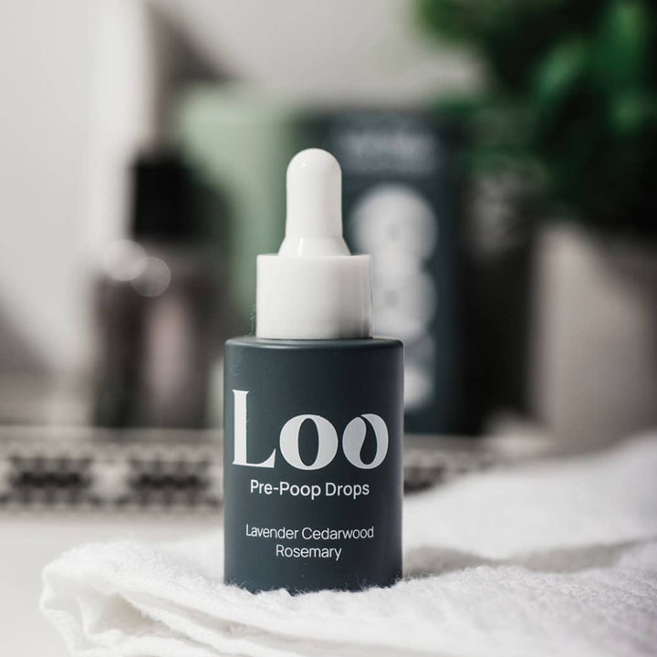 Lavender Cedarwood Rosemary Pre-Poop Toilet Drops, a toilet air freshener in a convenient dropper bottle.
