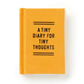 Orange notebook with 'A Tiny Diary for Tiny Thoughts' text on a white background