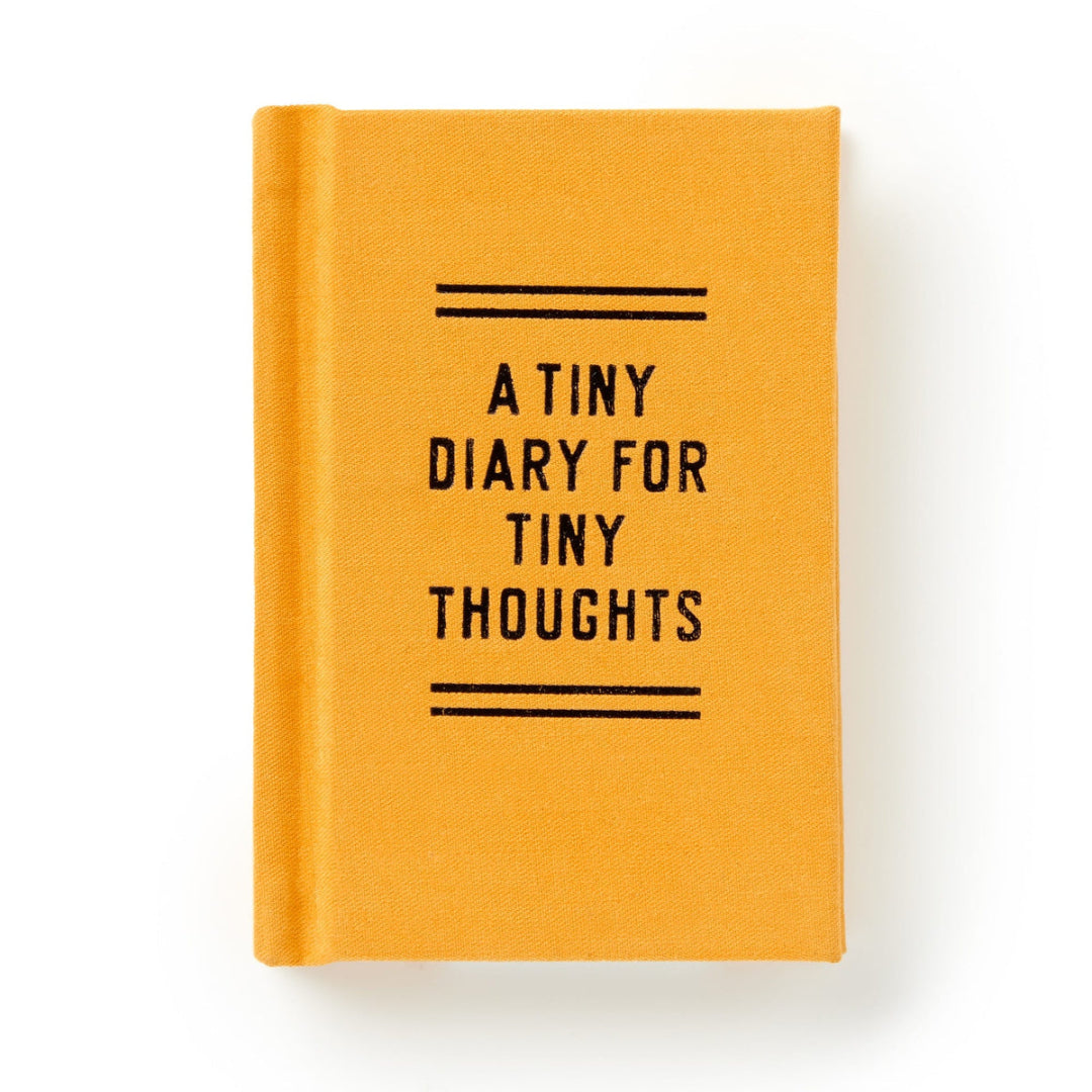 Orange notebook with 'A Tiny Diary for Tiny Thoughts' text on a white background