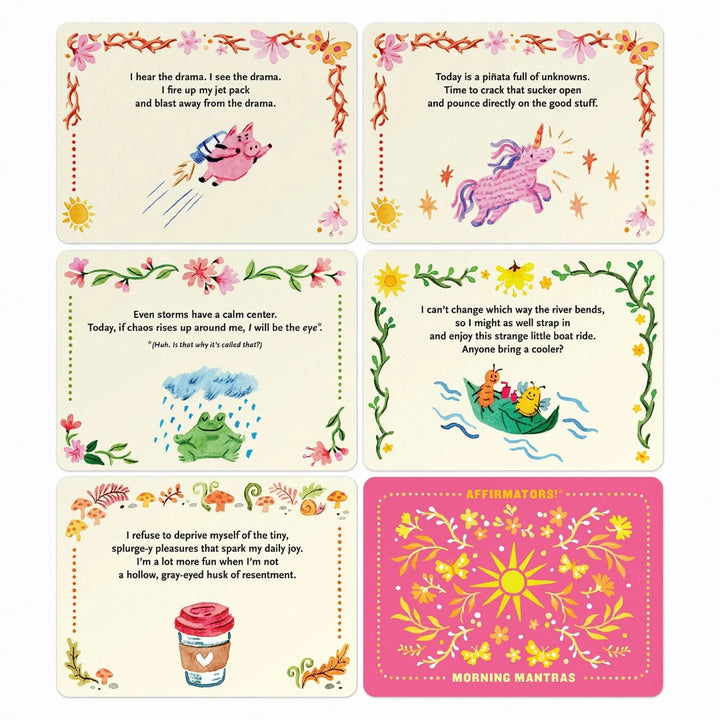 A pink box containing a deck of affirmation cards. The box has the text 