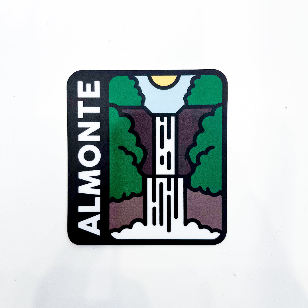 A vinyl sticker featuring a color block design with an illustration of a waterfall and sunset, and the text 'Almonte' prominently displayed.
