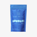 Blue packaging of Soap So Co. Bubbles Azure on a black background