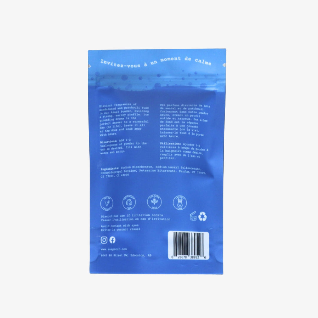 Blue packaging with text and symbols on a black background