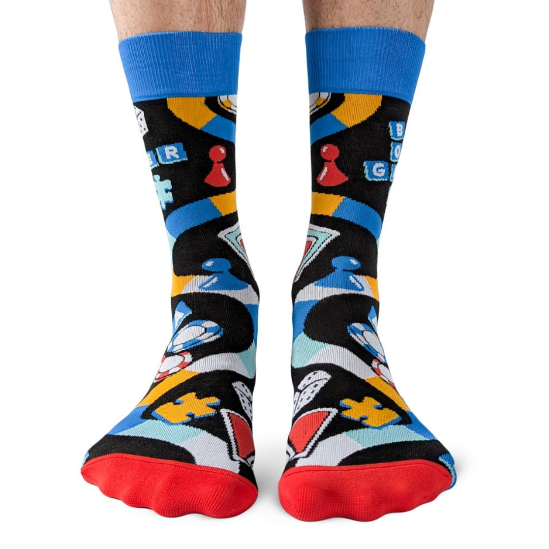 Colorful socks with abstract patterns on a white background