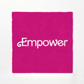 Pink fabric with 'Empower' text on a white background