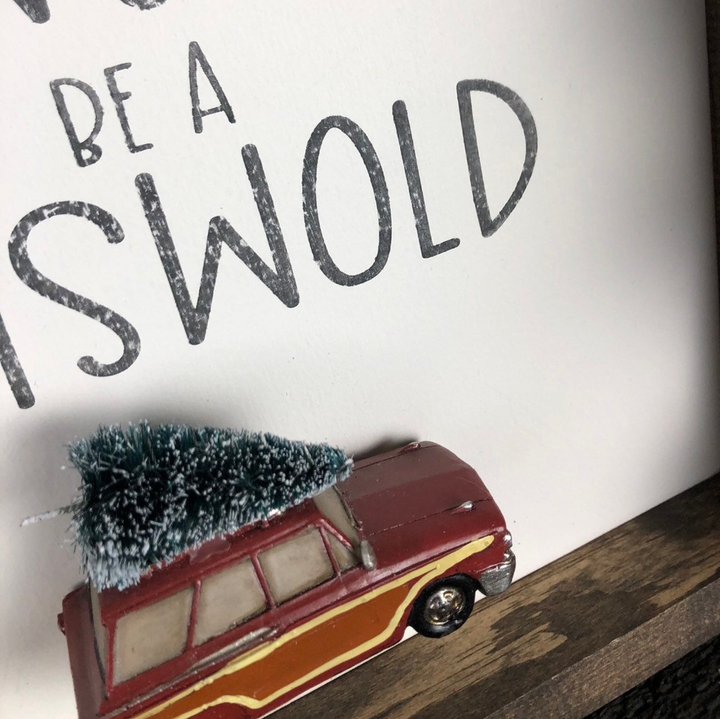 A framed sign with the text 