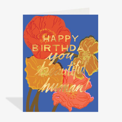 Greeting card with colorful flowers and 'Happy Birthday you beautiful human!' text on a blue background