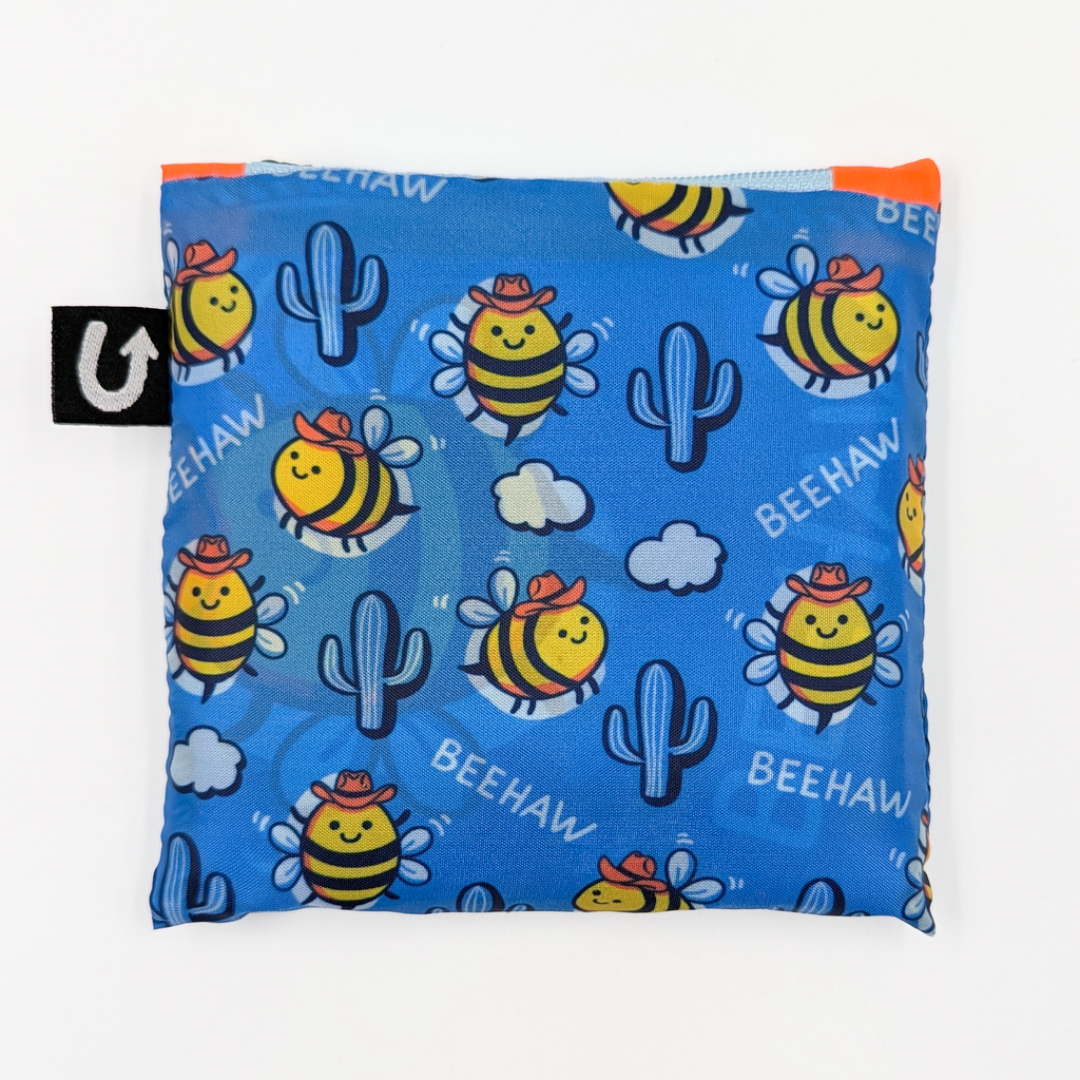 Blue pouch with bee and cactus pattern and 'BEEHAW' text on a white background