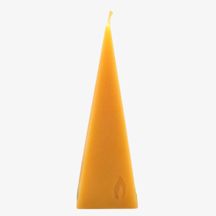 A yellow, pyramid-shaped beeswax candle. The candle has a smooth surface and a pointed tip. The base of the candle is slightly wider than the top.