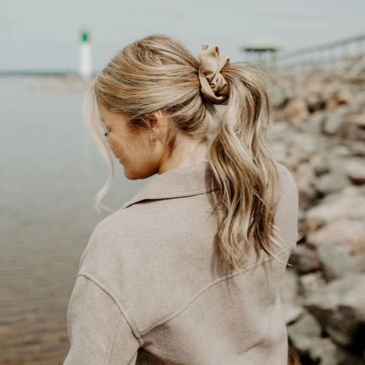 A cream-colored scrunchie.