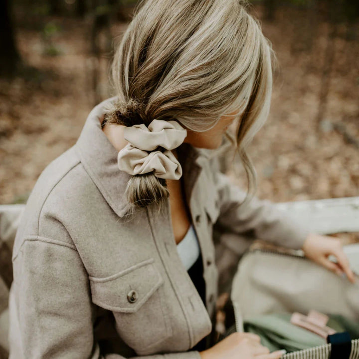 A cream-colored scrunchie.