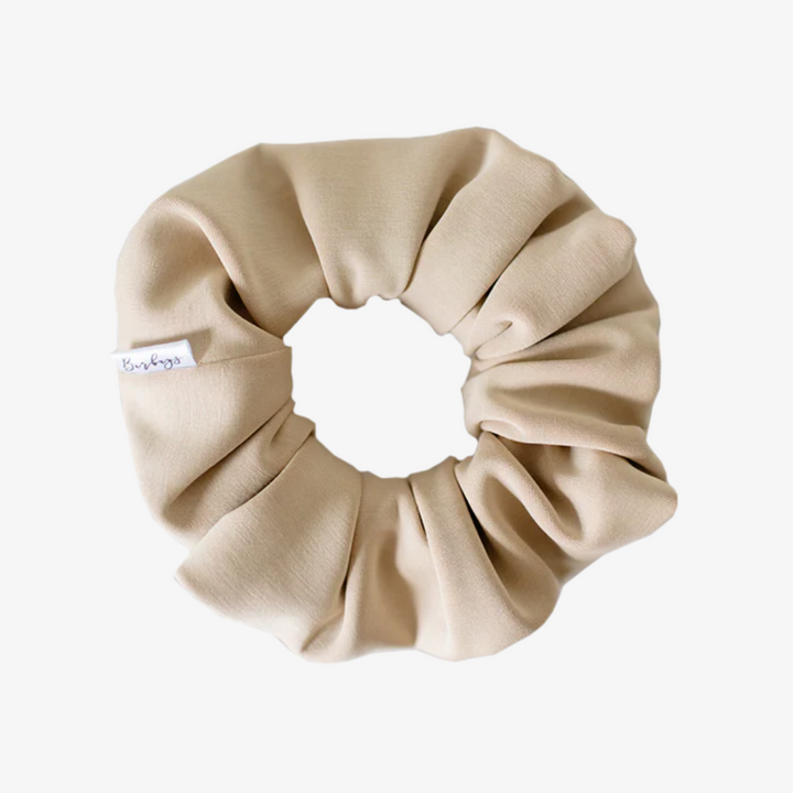 A cream-colored scrunchie.