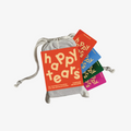 Set of 'happy tears' cards with a gray drawstring bag on a white background