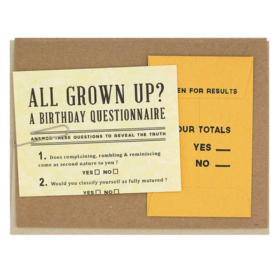 A kraft-colored greeting card featuring a yellow 