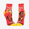 A pair of red ankle socks with yellow accents. One sock features a vintage-style illustration of a cowgirl riding a horse, with 