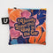 A colorful tote bag with a floral pattern and the text 