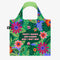 A green tote bag with a floral pattern. The text 