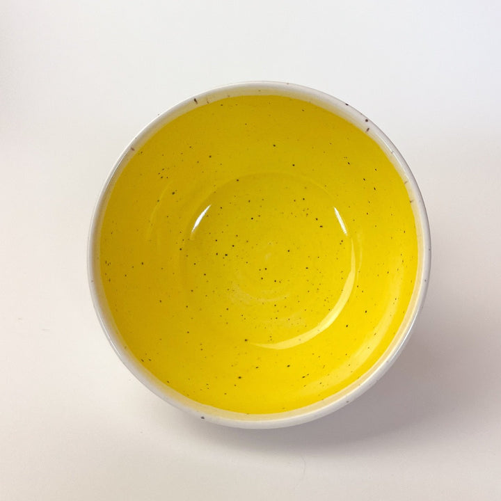 Yellow Colourful Trinket Dish, a small bowls with colour on the inside and speckled cream coloured clay on the outside.