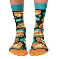 Colorful socks with food-themed design on a white background