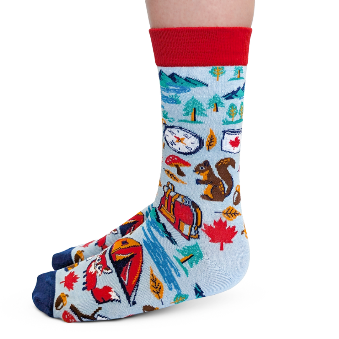 Colorful sock with nature-themed design on a white background