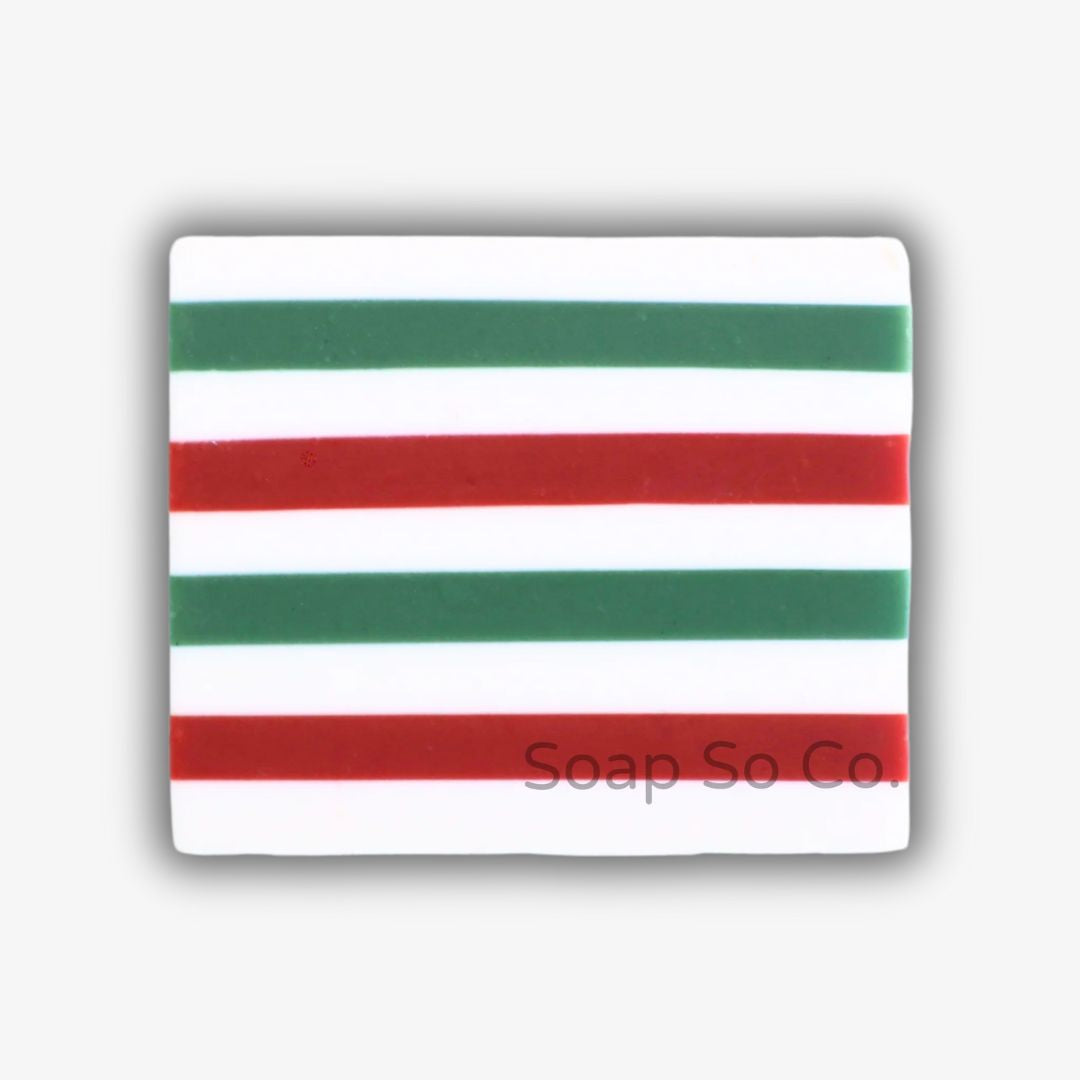 Rectangular soap with red, green, and white stripes on a white background