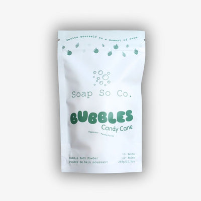 Soap So Co. Bubbles Candy Cane bubble bath powder packaging on a light gray background