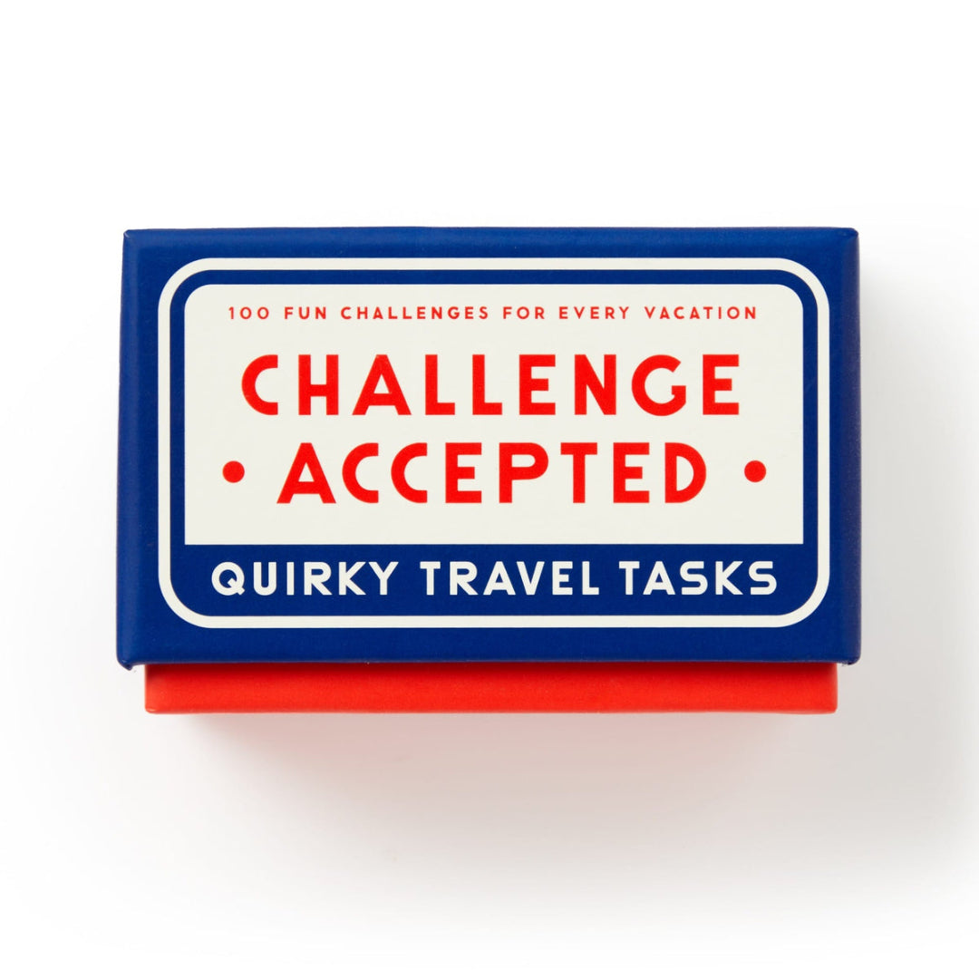 Box of 'Quirky Travel Tasks' with 'Challenge Accepted' text on a white background