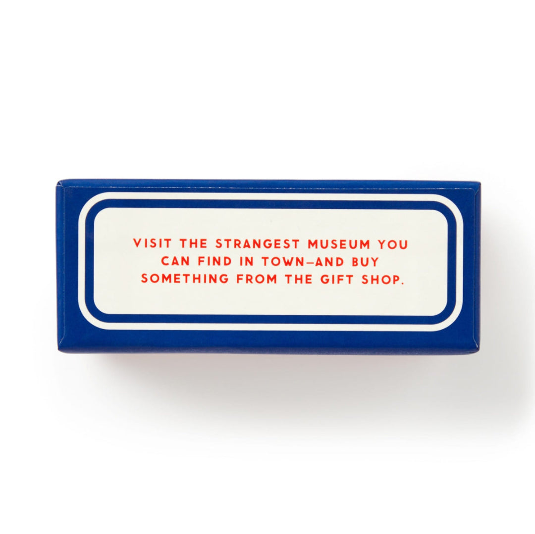 Rectangular sign with red text on a white background, placed on a blue border