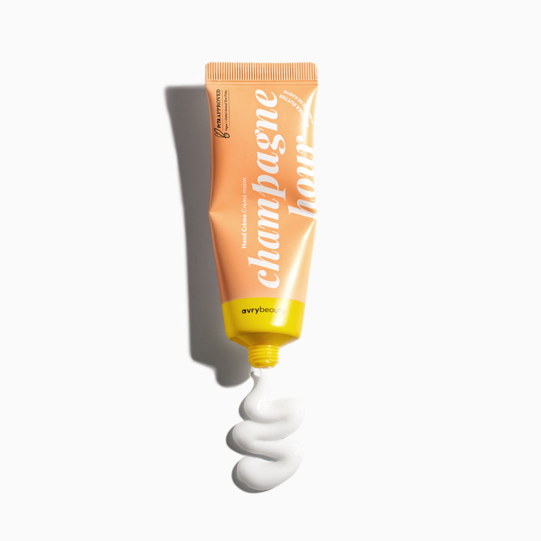 Tube of 'Champagne Hour' cream with a swatch on a white background