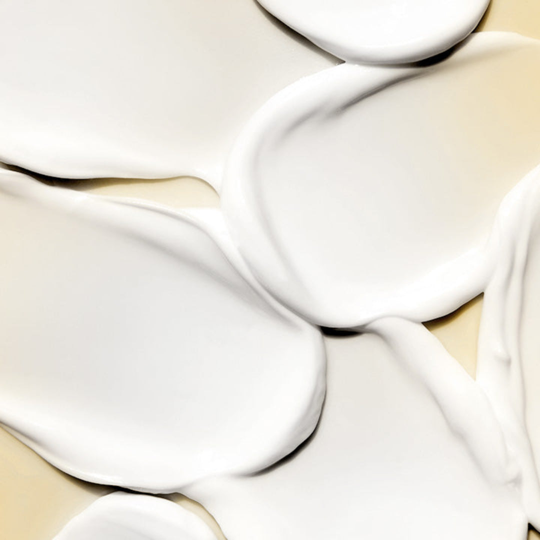 White ceramic plates on a beige background