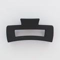 Black hair clip on a white background