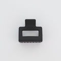 Black hair clip on a white background
