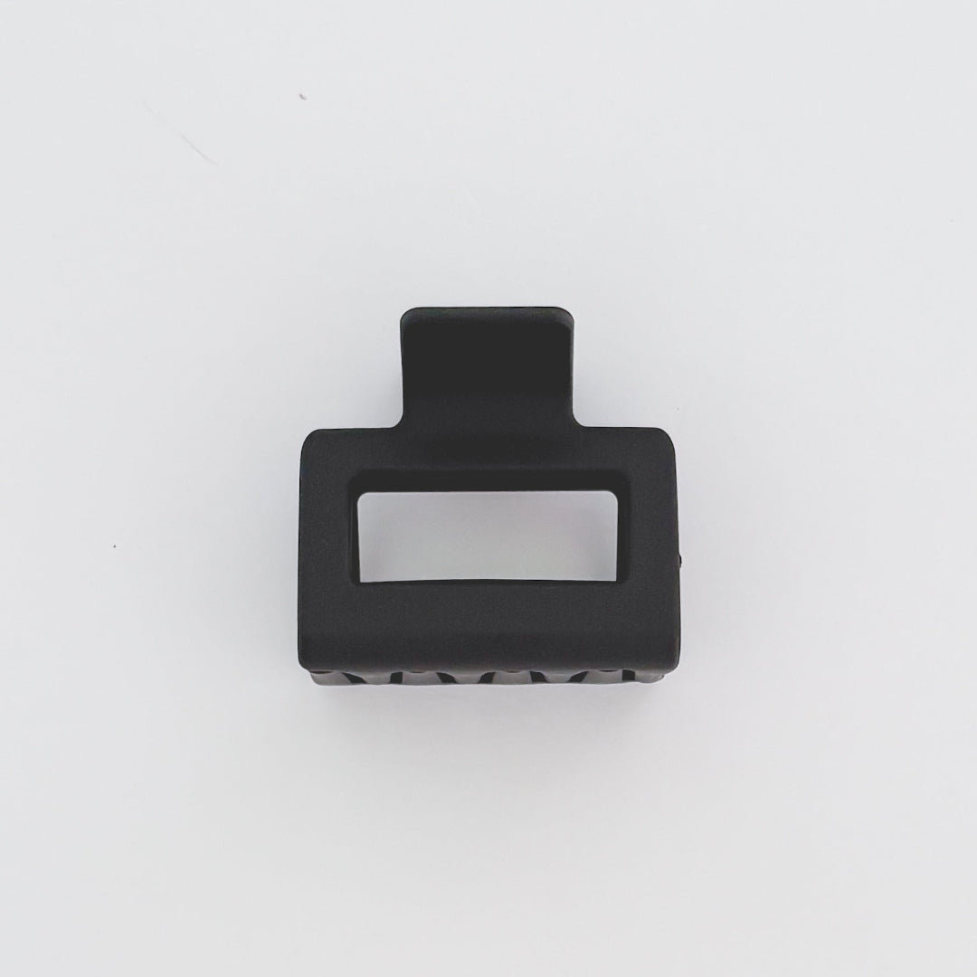 Black hair clip on a white background