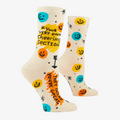 A pair of white crew socks with a fun and colorful design. The socks feature smiley faces, stars, and arrows, along with the text "Your Very Own Cheering Section" and "They Think You're Great."